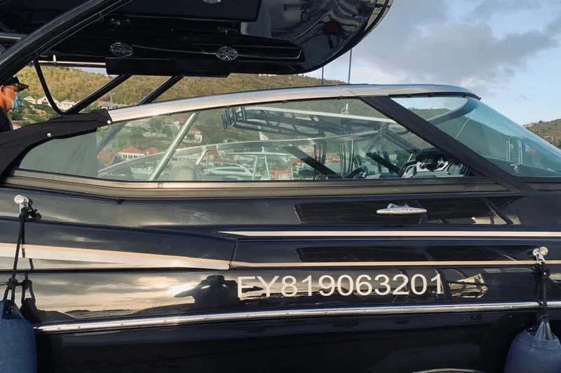 Cri Stellae Yacht Photos Pics 2018 Formula 350 Crossover Bowrider boat docked, side view with registration number visible.