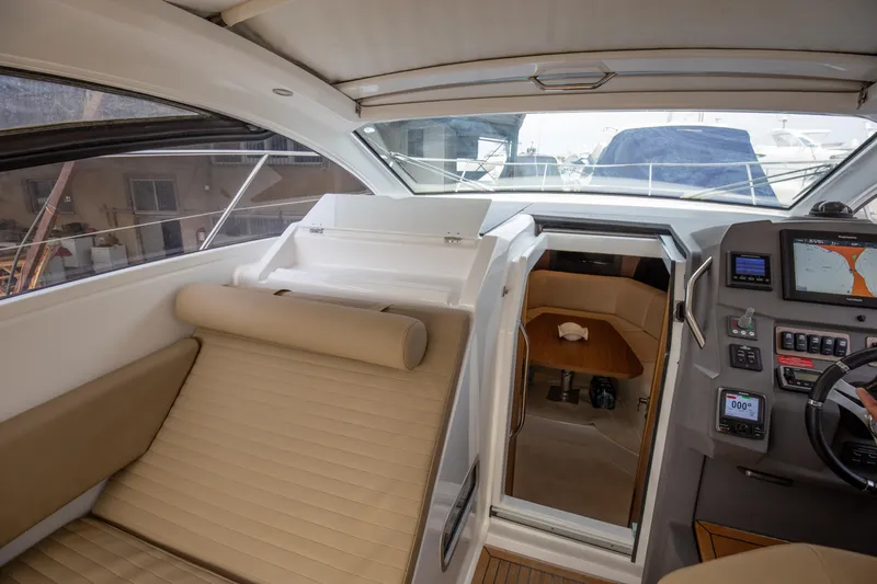  Yacht Photos Pics Interior view of 2017 Azimut 34 yacht cockpit with navigation controls.
