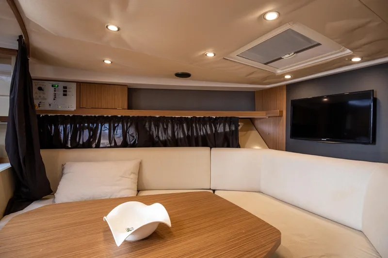  Yacht Photos Pics Luxurious interior of 2017 Azimut 34 yacht with cozy seating and modern amenities.