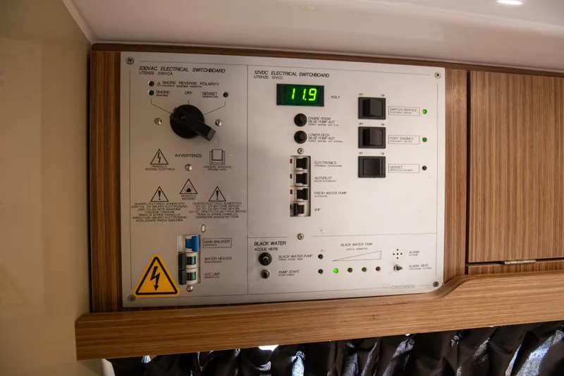  Yacht Photos Pics Electrical switchboard panel on a 2017 Azimut 34 yacht, displaying voltage and controls.