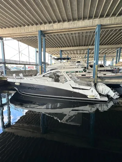  Yacht Photos Pics 2020 Azimut Verve 40 yacht docked in a covered marina.