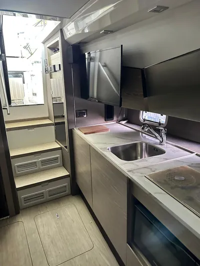  Yacht Photos Pics 2020 Azimut Verve 40 yacht interior kitchen with modern appliances and sleek design.