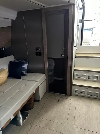  Yacht Photos Pics Interior of 2020 Azimut Verve 40 yacht, featuring seating and stairs.
