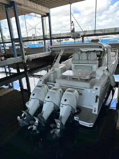  Yacht Photos Pics 2020 Azimut Verve 40 yacht docked with triple outboard engines.