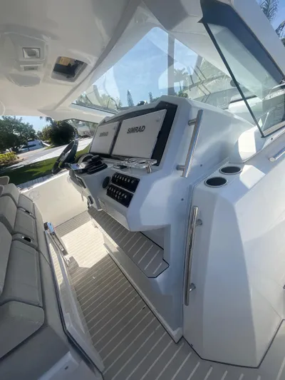  Yacht Photos Pics 2020 Azimut Verve 40 yacht cockpit with modern navigation system and sleek design.