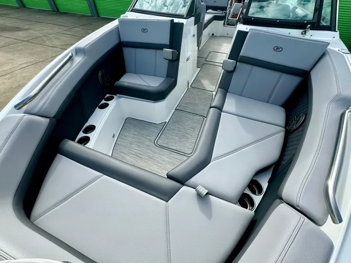  Yacht Photos Pics 2022 Cobalt R8 Outboard boat interior with gray seating and cup holders.