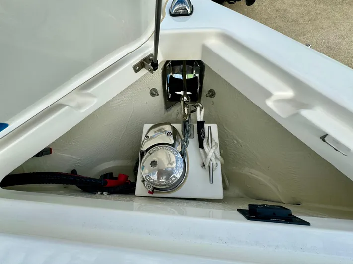  Yacht Photos Pics 2022 Cobalt R8 Outboard anchor compartment with winch and rope storage.