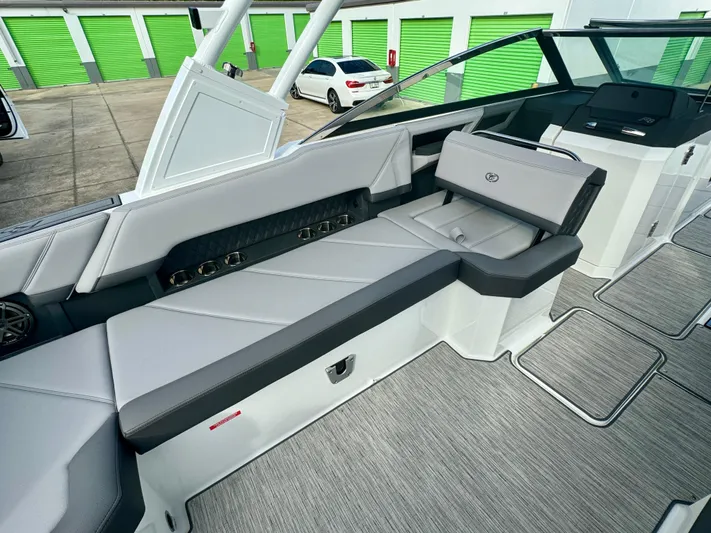  Yacht Photos Pics 2022 Cobalt R8 Outboard boat interior with sleek gray seating and modern design.