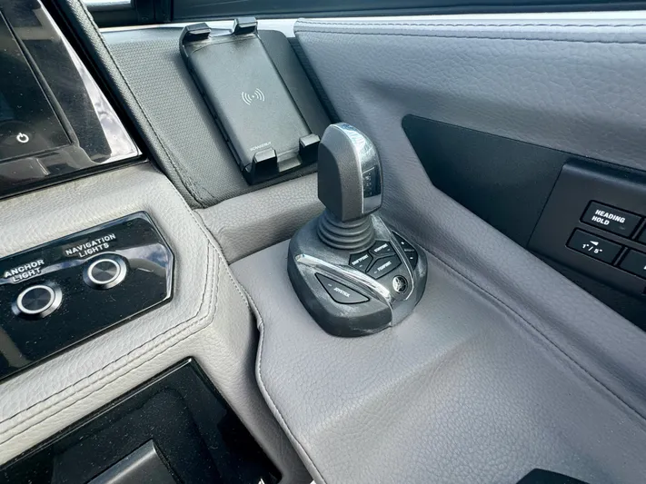  Yacht Photos Pics 2022 Cobalt R8 Outboard boat control panel with joystick and navigation buttons.