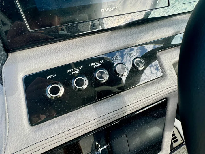  Yacht Photos Pics Control panel of 2022 Cobalt R8 Outboard boat with bilge pump switches.