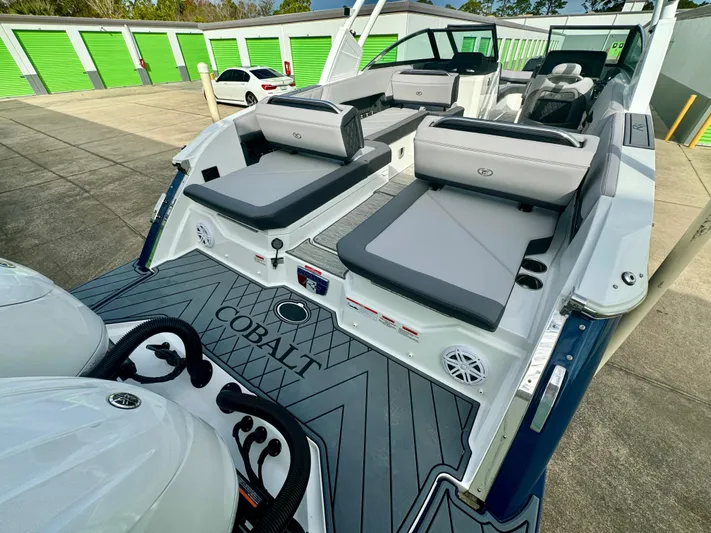  Yacht Photos Pics 2022 Cobalt R8 Outboard boat with spacious seating and modern design.