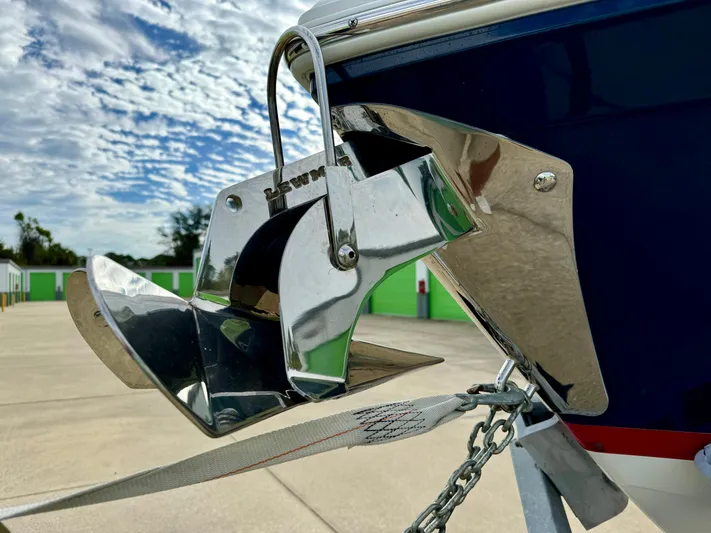  Yacht Photos Pics Close-up of 2022 Cobalt R8 Outboard boat anchor in storage.