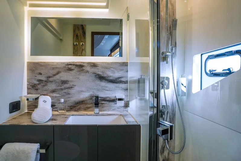  Yacht Photos Pics Luxurious bathroom in 2025 Prestige M48 yacht with modern fixtures and elegant design.