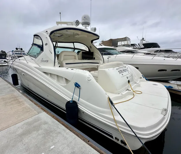 Aztec Princess Yacht Photos Pics 2006 Sea Ray 44 Sundancer yacht docked at marina, featuring sleek design and spacious deck.