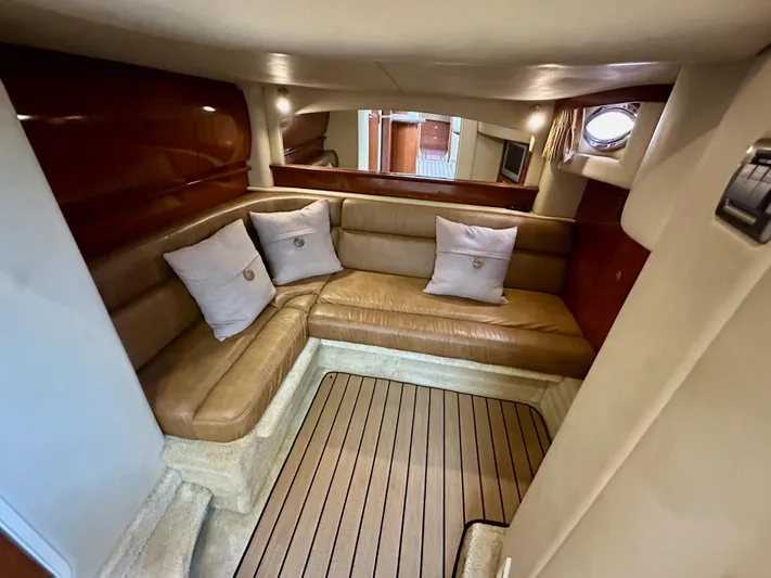 Aztec Princess Yacht Photos Pics Interior of 2006 Sea Ray 44 Sundancer with leather seating and wooden accents.
