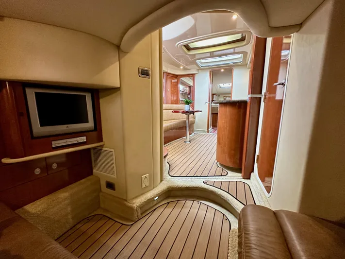 Aztec Princess Yacht Photos Pics Interior of 2006 Sea Ray 44 Sundancer yacht, featuring elegant wood finishes and modern amenities.