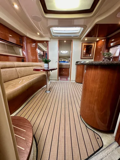 Aztec Princess Yacht Photos Pics Luxurious interior of a 2006 Sea Ray 44 Sundancer yacht with elegant wood finishes.