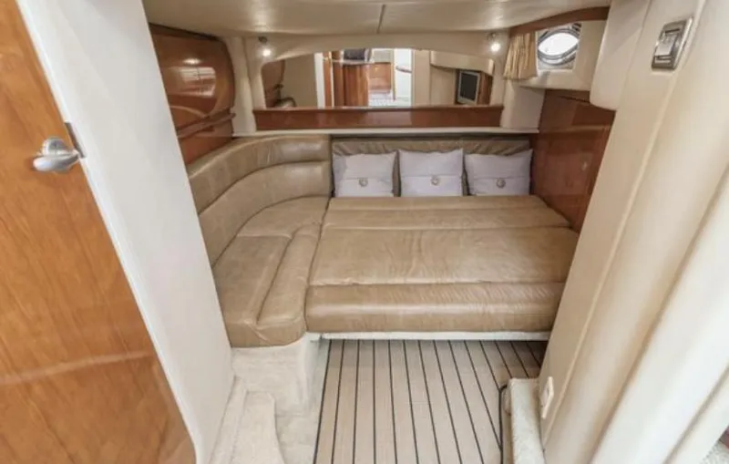 Aztec Princess Yacht Photos Pics Luxurious interior of 2006 Sea Ray 44 Sundancer yacht with beige leather seating.