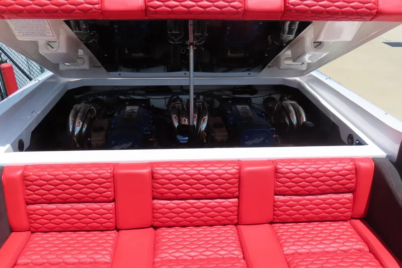  Yacht Photos Pics 2009 Donzi 35ZR boat engine compartment with red quilted seating.