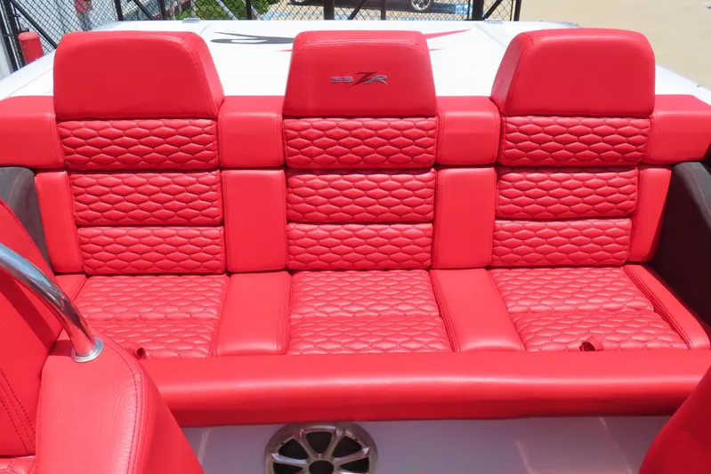  Yacht Photos Pics Red quilted seats in a 2009 Donzi 35ZR boat interior.