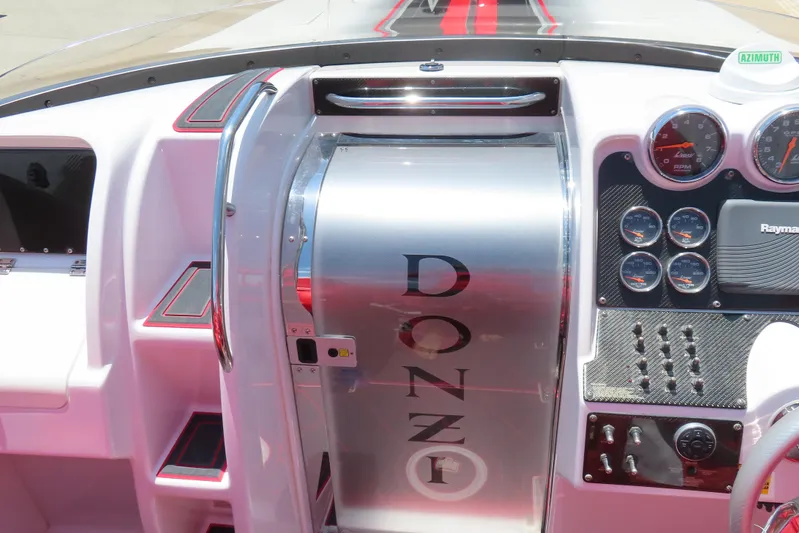  Yacht Photos Pics 2009 Donzi 35ZR boat dashboard with gauges and controls, featuring sleek design elements.