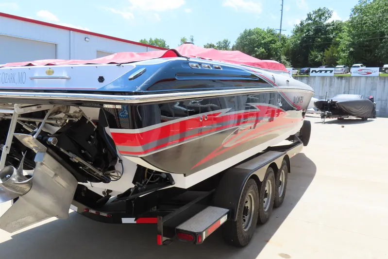  Yacht Photos Pics 2009 Donzi 35ZR speedboat on trailer, featuring sleek design and vibrant red accents.