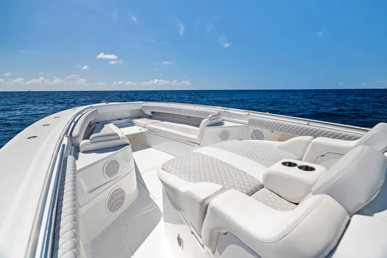 Strong III Yacht Photos Pics Luxurious 2022 HCB Suenos boat interior with plush seating on open ocean.