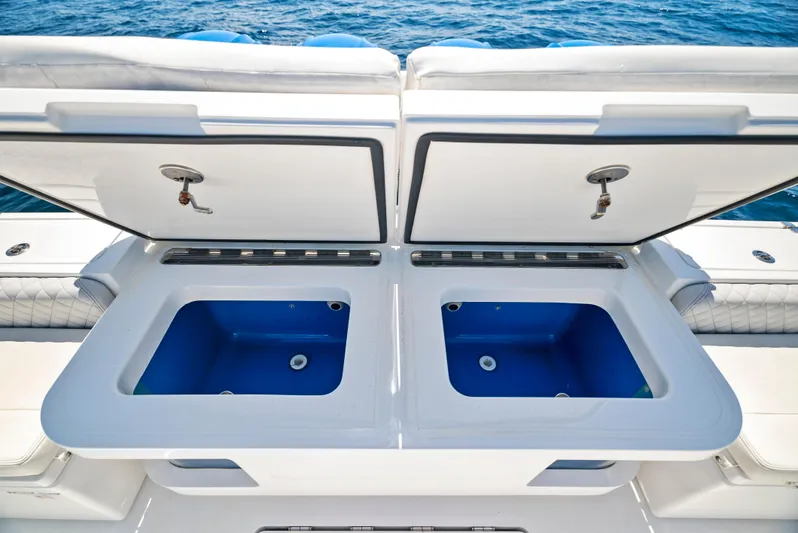 Strong III Yacht Photos Pics 2022 HCB Suenos boat with open dual storage compartments on deck.