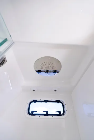 Strong III Yacht Photos Pics 2022 HCB Suenos boat interior shower with window and modern fixtures.