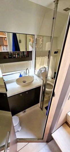  Yacht Photos Pics Modern bathroom interior of 2023 Cranchi Z35 yacht, featuring sleek design and compact amenities.