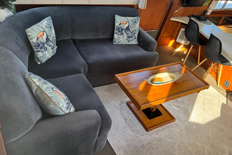 Lone Wolf Yacht Photos Pics L-shaped couch with storage under