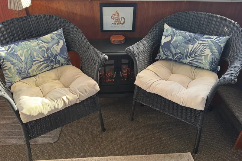 Lone Wolf Yacht Photos Pics Cozy seating for two with electric fireplace for cold mornings or evenings