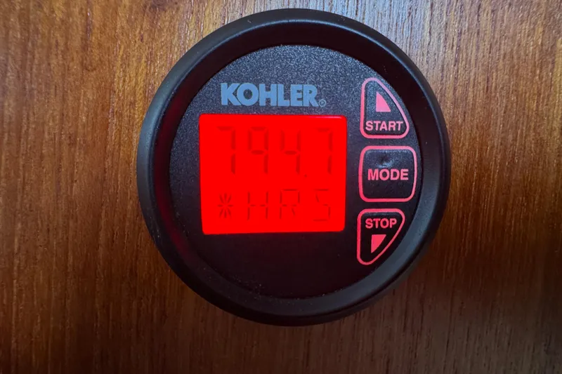 Lone Wolf Yacht Photos Pics Kohler hour meter displaying 794.7 hours