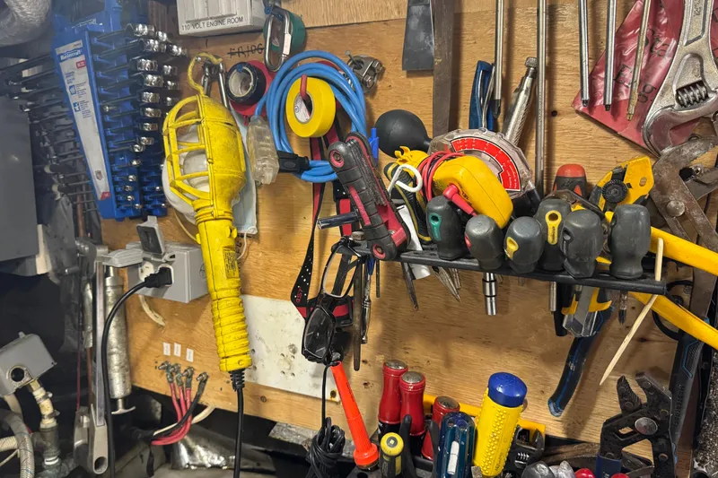 Lone Wolf Yacht Photos Pics Workshop tool wall with various hand tools and electrical equipment included