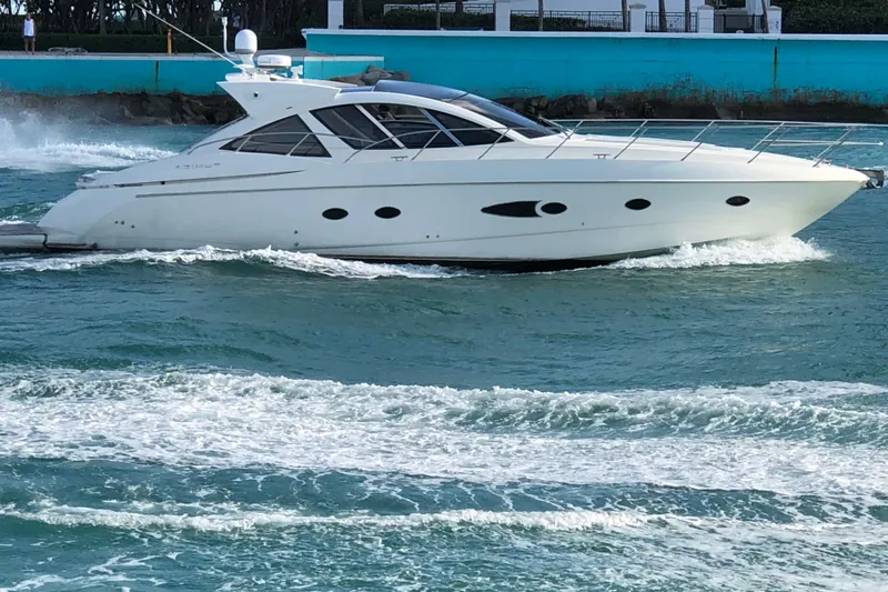 Sol Yacht Photos Pics 2010 Azimut Atlantis 54 yacht cruising on open water.