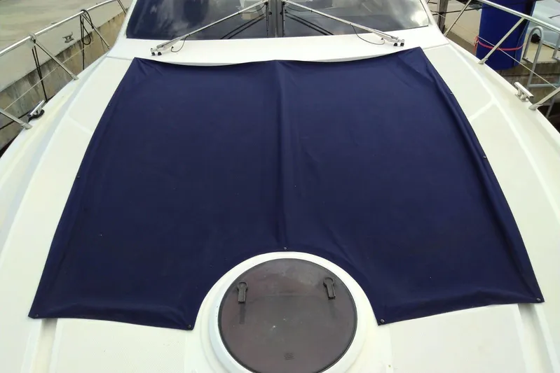 Sol Yacht Photos Pics 2010 Azimut Atlantis 54 yacht deck with blue sunshade cover.