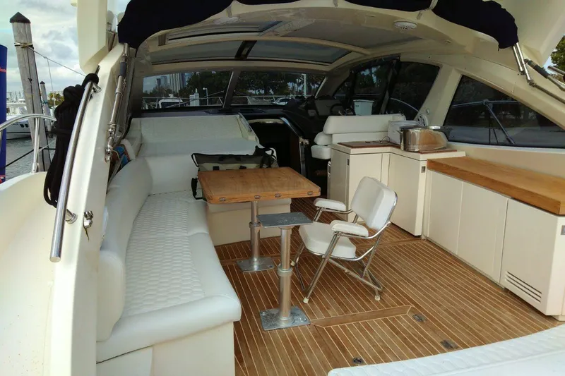 Sol Yacht Photos Pics Luxurious 2010 Azimut Atlantis 54 yacht interior with elegant seating and wooden flooring.