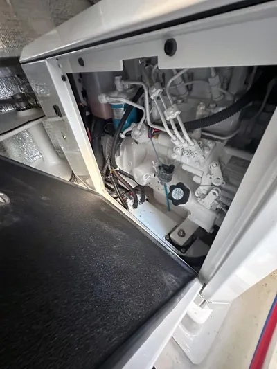 Hamlet Yacht Photos Pics Engine compartment of a 2023 Leopard 46PC, showcasing mechanical components and wiring.