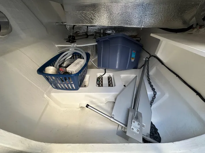 Hamlet Yacht Photos Pics Storage compartment of 2023 Leopard 46PC boat with anchor and supplies.