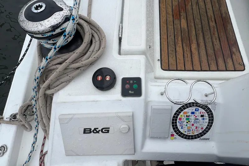  Yacht Photos Pics Deck of 2020 Beneteau Oceanis 41.1 with winch, ropes, and control panel.