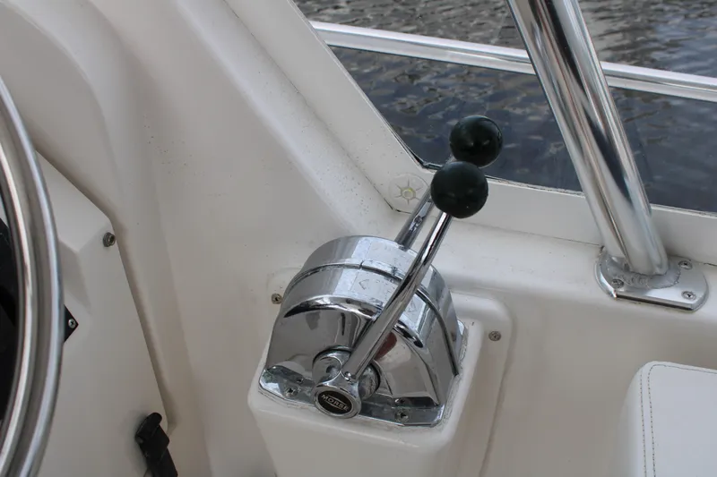 Irish Luck Yacht Photos Pics Close-up of 2002 Mainship Pilot 34 boat throttle controls.