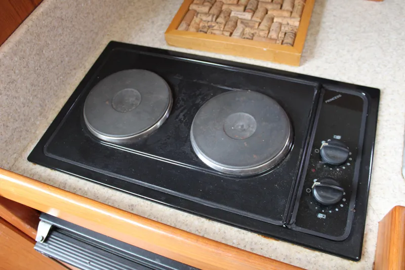 Irish Luck Yacht Photos Pics Two-burner electric stove in 2002 Mainship Pilot 34 boat kitchen.
