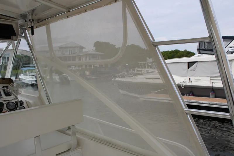 Irish Luck Yacht Photos Pics Interior view of a 2002 Mainship Pilot 34 boat at a marina.