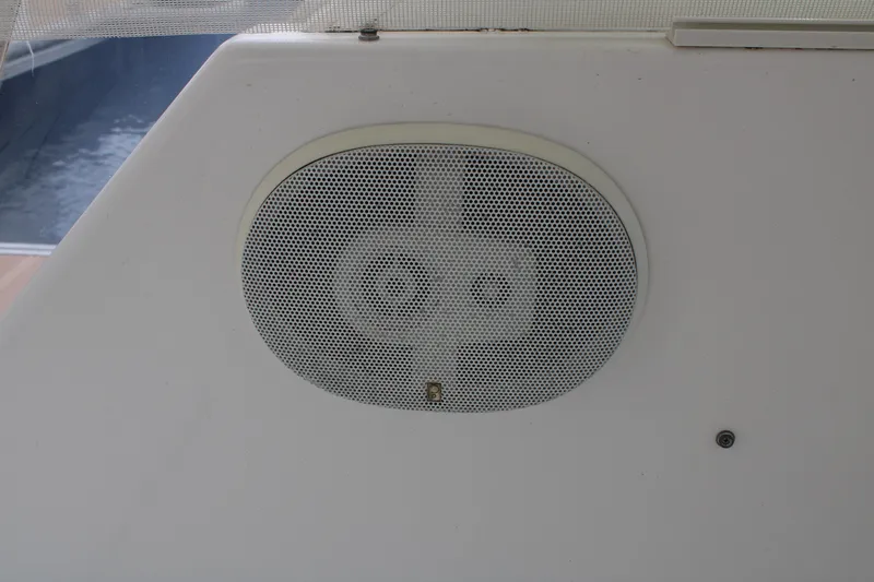 Irish Luck Yacht Photos Pics Oval speaker on 2002 Mainship Pilot 34 boat interior.