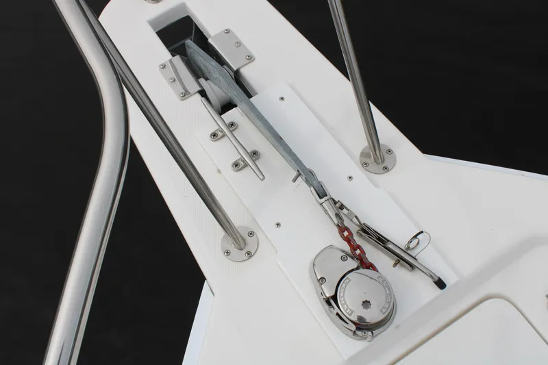 Irish Luck Yacht Photos Pics Anchor system on a 2002 Mainship Pilot 34 boat deck, featuring stainless steel fittings.