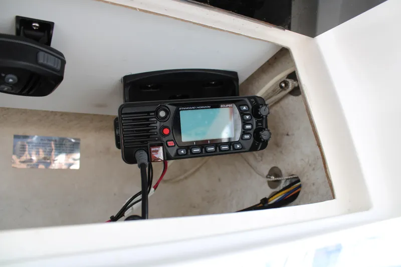Irish Luck Yacht Photos Pics VHF radio installed on 2002 Mainship Pilot 34 boat dashboard.