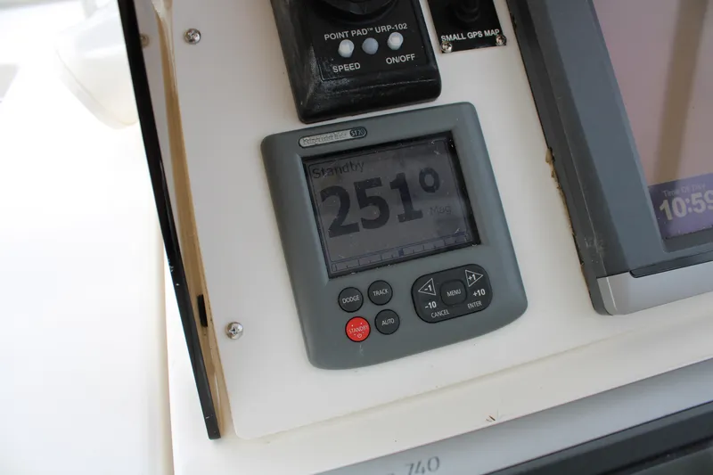 Irish Luck Yacht Photos Pics Control panel of a 2002 Mainship Pilot 34 boat showing navigation instruments.