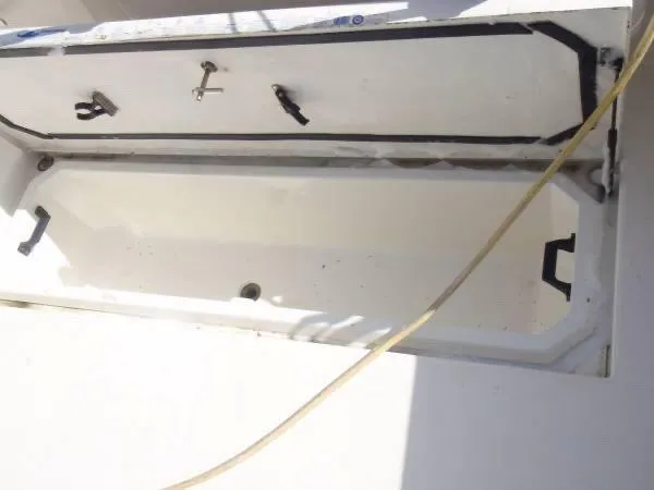 Rampage Yacht Photos Pics Open storage compartment on a 2001 Rampage 30 Express boat.