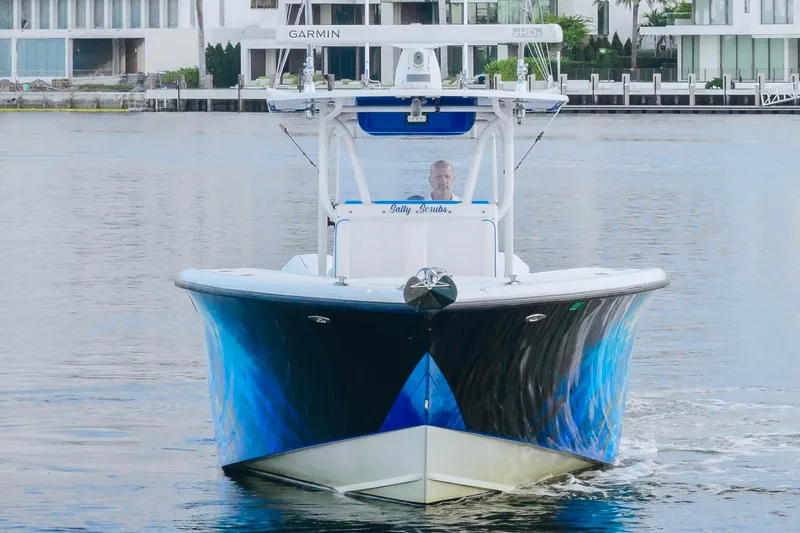  Yacht Photos Pics 2007 Yellowfin 36 Offshore boat on water, featuring a striking blue hull design.
