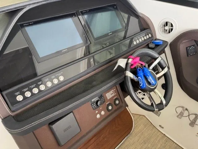  Yacht Photos Pics 2016 Cobalt A40 boat helm with modern instruments.